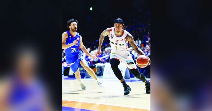 sports Parks_superimposed Bobby Ray Parks Jr. of Osaka Evessa dribbles the ball away from a defender. PHOTO COURTESY OF JAPAN B.LEAGUE