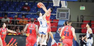 Rain or Shine Elasto Painters’ Jhonard Clarito blocks the shot attempt of Hong Kong Eastern’s Yin Lung Cheung. PBA PHOTO