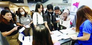 Hopefuls hunt for jobs at a job fair in Pasay City. The Philippine Statistics Authority reported Friday, Dec. 6, 2024, that the country's unemployment rate fell to 3.9 percent in October. PNA PHOTO BY YANCY LIM