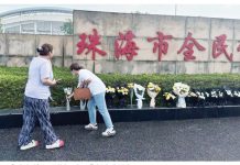 China executes man for car rampage that killed dozens People placed flowers outside a stadium in Zhuhai after a car rampage that killed dozens. REUTERS