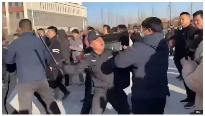 China_resized A policeman beats a protester with a baton in Pucheng, Shaanxi province in China during large-scale demonstrations. BBC