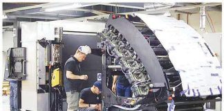 Technicians inspect a printing machine for ballots and other forms for the 2025 midterm polls at the National Printing Office in Quezon City. PNA