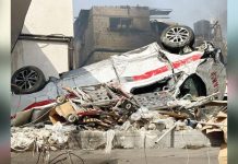Israeli attacks pushing Gaza healthcare to total collapse A damaged ambulance is seen upside down outside Kamal Adwan hospital in Beit Lahia, northern Gaza Strip. AFP