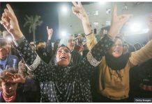 Israel to free over 1,800 Palestinian prisoners Palestinians celebrate the announcement of ceasefire deal in Deir al-Balah, central Gaza.