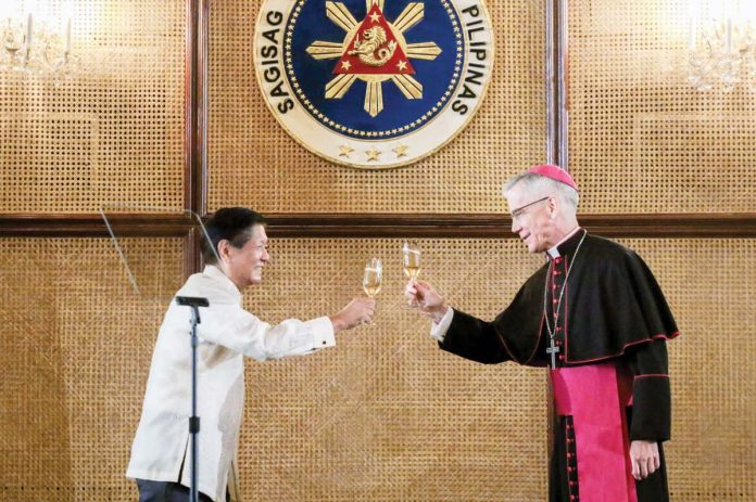 PBBM_1_resized President Ferdinand Marcos Jr. and Apostolic Nuncio to the Philippines Archbishop Charles Brown propose a toast during the annual Vin D’ Honneur (wine of honor) for government officials and diplomatic corps at the Malacañan Palace on January 11, 2025. YUMMIE DINGDING, PPA