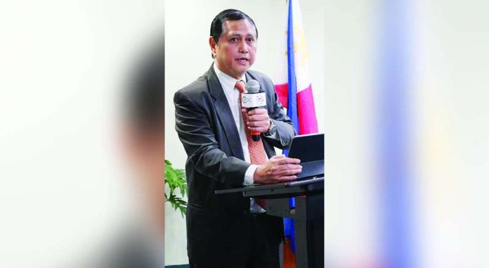 PDIC-protection-1_superimposed Philippine Deposit Insurance Corp. president and CEO Roberto Tan says his agency had completed a study that recommended hiking the current maximum deposit insurance coverage of P500,000 per depositor per bank. PDIC PHOTO