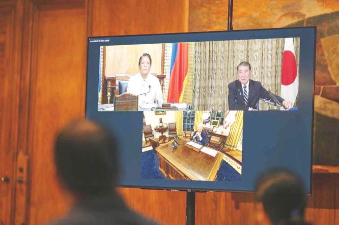 PH_Japan_US_1_resized The Philippines, the US, and Japan vowed on Monday to continue working together to enhance and deepen trilateral ties, particularly in the areas of economic, maritime, and technology cooperation, during a virtual trilateral video call between President Ferdinand “Bongbong” Marcos Jr., US President Joe Biden and Japan Prime Minister Shigeru Ishiba. PCO