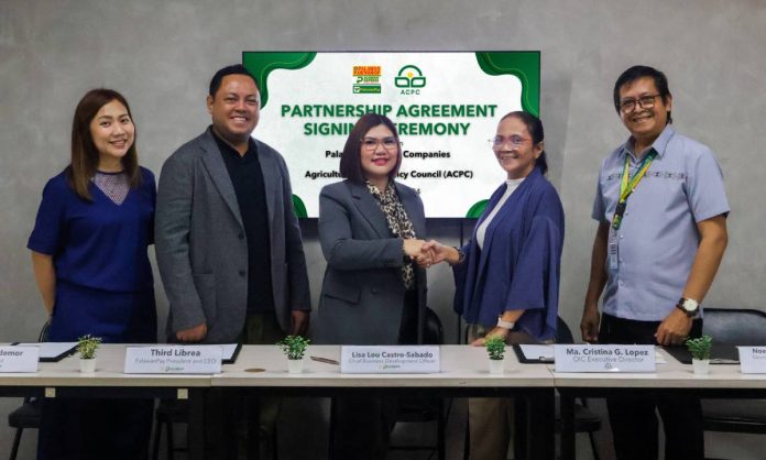 Photo 1 - Palawan x ACPC Palawan Group of Companies executives from L-R: Missy Baldemor, B2B Head; Third Librea, PalawanPay President and CEO; and Lisa Lou Castro-Sabado, Chief Business Development Officer, joined by Agricultural Credit Policy Council executives: Ma. Christina Lopez, OIC Executive Director; and Noel Clarence Ducusin, Director for Program Development and Capacity Building.