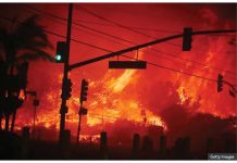 LA residents abandon cars to flee wildfire on foot In Los Angeles, California, A windstorm whipped a seemingly typical brush fire into a raging inferno within a matter of hours on Tuesday, sending the blaze racing towards the Pacific Palisades area. GETTY IMAGES