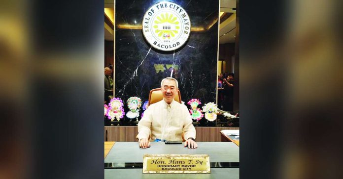 adopted son 1_superimposed SY. BACOLOD CITY PIO PHOTO