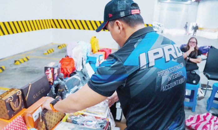 greenhills_mall_1_resized The Bureau of Customs, through its Intellectual Property Rights Division, seized counterfeit goods worth approximately P11 billion during an operation in Binondo, Manila on June 14, 2024. The counterfeit items included brands such as Gucci, Chanel, Louis Vuitton, Nike, Rolex, Apple, Hermes, Guess, Vans, Santa Cruz, and Dior. BUREAU OF CUSTOMS PHOTO