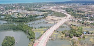 The P2.261-billion Iloilo River North Bank Road (Iloilo Sunset Boulevard) covers a five-kilometer, four-lane concrete road. It connects Barangay Tabucan in Mandurriao, Iloilo City, to Barangay Cagbang in Oton, Iloilo passing through the Iloilo Business Park and intersecting with the Iloilo Circumferential Road. DPWH Region 6 photo