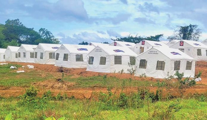 ime-Tent-City-(1) The “tent city” in Himamaylan City, Negros Occidental is steadily progressing, with 40 out of the planned 395 family tents already set up. These tents, provided by the Office of Civil Defense, will serve as temporary shelters for evacuees displaced by the Kanlaon eruption. The site is being developed to ensure it meets the basic needs of the families who will be staying there. Ongoing work includes the installation of plumbing, water, and sanitation facilities to provide safe and hygienic living conditions. PHOTO FROM CIVIL DEFENSE WESTERN VISAYAS FACEBOOK PAGE