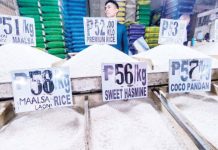 The Department of Agriculture says maximum suggested retail price (MSRP) for imported rice will be slashed to P55 per kilogram by Feb. 1, lowered further to P52 by February 15, and by March 1, it is expected to break the P50 per kilo, with the MSRP at P49. PNA PHOTO BY JOAN BONDOC