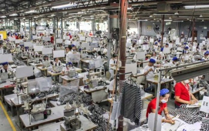 manufacturing_sector_resized The Philippine manufacturing sector closed 2024 on a high note according to S&P Global. Undated photo shows workers in an apparel manufacturing plant located at the Mactan Export Processing Zone in Cebu province. PHOTO COURTESY OF MEPZ WORKERS ALLIANCE