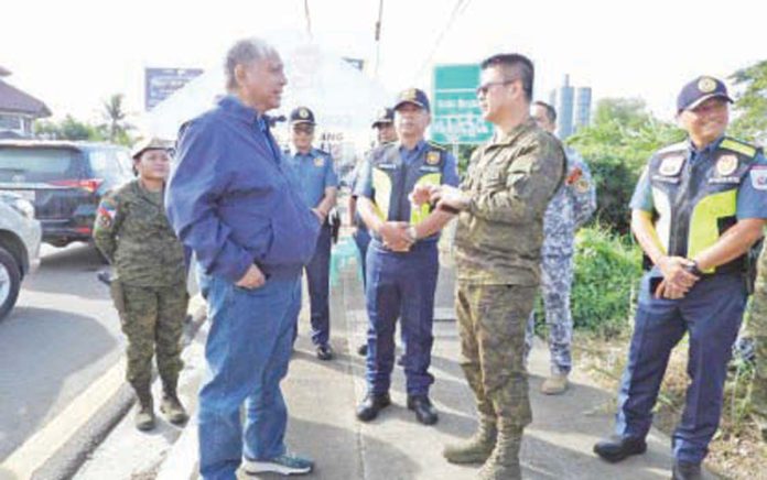 rebel-free-1 Major General Marion Sison (second from right), commander of the Philippine Army’s 3rd Infantry Division, participates in the launch of checkpoints by the Western Visayas Regional Joint Control Center as the election period started on January 12, 2025. In a statement the following day, he affirmed that no reports of rebel-related extortion activities, such as “permit to campaign” or “permit to win”, have surfaced since the start of the election period. Photo courtesy of 3DPAO