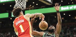 Atlanta Hawks’ Jalen Johnson (1) blocks a shot by Boston Celtics’ Jaylen Brown (7). AP PHOTO/ROBERT F. BUKATY