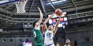 Magnolia Chicken Timplados Hotshots’ Zavier Lucero tries to score against the defense of Terrafirma Dyip’s Kemark Carino. PBA Photo