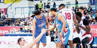 Sam Deguara is picked up by his Zamboanga Valientes’ teammates after going down with a hit from an opponent. PHOTO COURTESY OF DUBAI BASKETBALL CHAMPIONSHIP