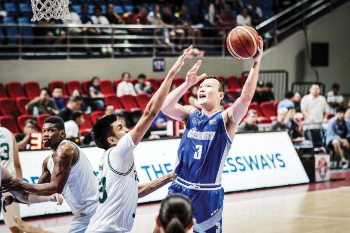 sports_PBA_resized Hong Kong Eastern’s Ramon Cao tries to score against the defense of Terrafirma Dyip's Kemark Cariño. PBA PHOTO