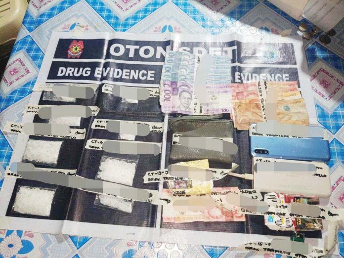tokhang_surrenderer1_copy_resized Approximately 80 grams of suspected shabu valued at P544,000 were recovered by the police from two drug suspects in Barangay Trapiche, Oton, Iloilo on Jan. 30, 2025. IPPO PHOTO