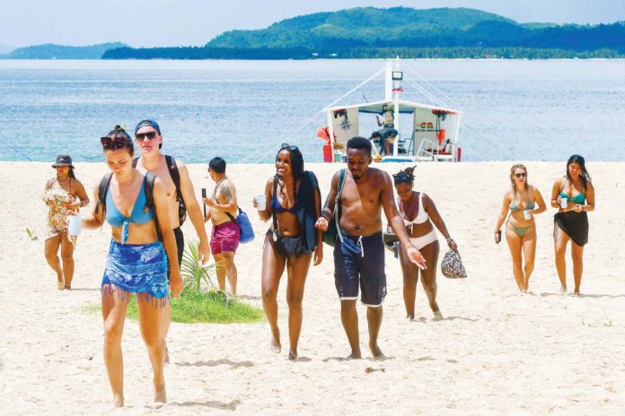 tourist_revenues_resized Tourists flock to Daku Island in Siargao Island, Surigao Del Norte. MARK DEMAYO/ABS-CBN NEWS FILE PHOTO