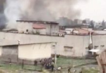 More than 100 women raped, burned alive in Congo jailbreak Footage from a jailbreak in Congo shows people fleeing from the building as black smoke rises into the air. BBC