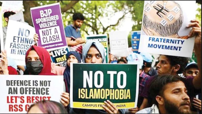India_1_resized Protesters hold placards that read “No to Islamophobia” and “BJP-sponsored violence not a clash” during a demonstration against anti-Muslim violence and hate crimes in New Delhi. Several protests have been held against anti-Muslim violence and hate speech in India. GETTY IMAGES