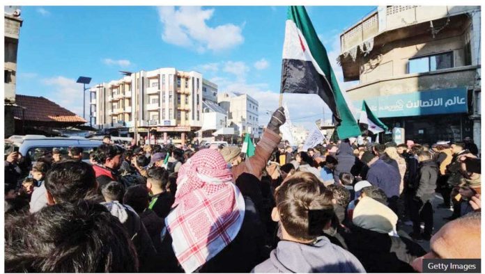 Israel_1_resized Syrians protest against Israeli Prime Minister Benjamin Netanyahu’s demilitarization demand in Quneitra province. GETTY IMAGES