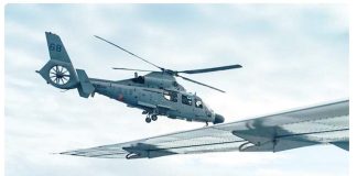 An aircraft identified by the Philippine Coast Guard as a Chinese navy helicopter flies dangerously close to a Bureau of Fisheries and Aquatic Resources plane during an aerial reconnaissance flight at Scarborough Shoal in the South China Sea on February 18, 2025. ALJAZEERA, JAM STA ROSA, AFP