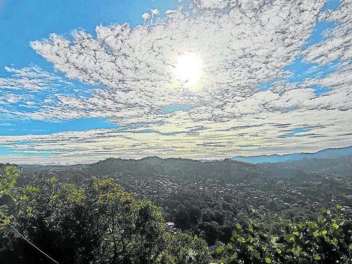 Clouds, appearing like fluffy cotton candies, blow through the morning skies in Baguio City where temperatures are low. File photo from PHILIPPINE DAILY INQUIRER / KIMBERLIE QUITASOL