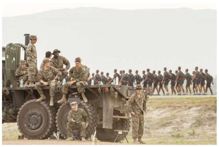 US_PH_1_resized US troops look on as Philippine military cadets train at a naval base where the annual joint military exercises between US and Philippine troops called “Balikatan” or shoulder-to-shoulder are held in San Antonio, Zambales province, Philippines, April 26, 2023. REUTERS