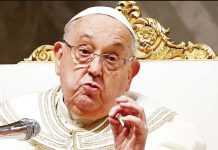 Pope asks for prayers in message from hospital Pope Francis in white and gold vestments and glasses leads prayers at Saint Peter's Basilica at the Vatican at the beginning of February. REUTERS