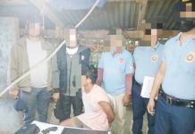 Over P800K ‘shabu’, gun intercepted in Calinog raid Alias “Bebot” (sitting) was caught with suspected shabu and a 12-gauge shotgun in a raid in Calinog, Iloilo on Monday morning, Feb. 10, 2025. CALINOG MUNICIPAL POLICE STATION PHOTO