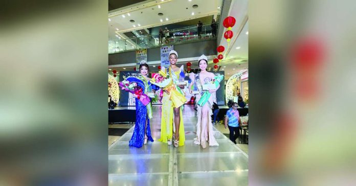 ime Miss Jaro 1_superimposed The newly crowned Miss Jaro 2025, Ashlee Emilliene Ngu (center), strikes a pose with her fellow finalists, Ma. Alessandra Louise Huyaban (right, the first runner-up) and Marie Krystel Angela Jacildo, the second runner-up, during the coronation night at Robinsons Place Jaro on February 1. Photo from MH Del Pilar Facebook Page