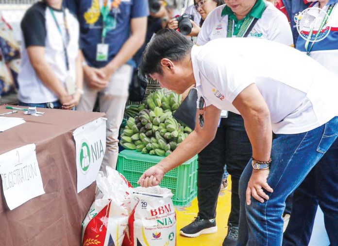 ime-PBBM-1 President Ferdinand Marcos Jr. checks the “Kadiwa ng Pangulo” store set up during the “Trabaho para sa Bagong Pilipinas para sa 4Ps” job fair at the Iloilo Sports Complex in La Paz, Iloilo City on February 13. PCO