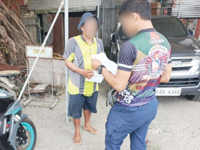 kabankalan-fugitive Police successfully apprehended alias “Kalongo” (right), Kabankalan City’s No. 3 most wanted person, in Barangay Ungka, Jaro, Iloilo City, on Feb. 17, 2025. ICPO PHOTO