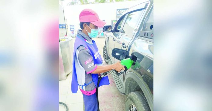 oil price_superimposed Several oil firms will increase gasoline and diesel prices by 80 centavos per liter, and kerosene by 10 centavos per liter today, Feb. 18, 2025. AJ PLACULLO/PN
