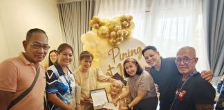 The 100-year-old Lola Josefina receives a P50,000 cash gift from the Roxas City Government. MAYOR RONNIE DADIVAS/FACEBOOK PHOTO