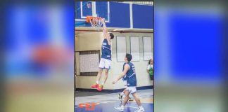 Bacolod Tay Tung High School Thunderbolts’ Paul Barcelona scores on a two-handed dunk. PHOTO COURTESY OF BIKI MOTOGRAPHY