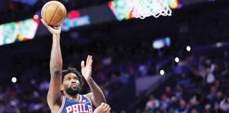 Philadelphia 76ers’ Joel Embiid scores against the defense of Dallas Mavericks' Daniel Gafford. AFP PHOTO