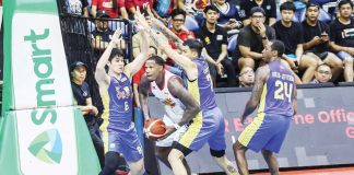 TNT Tropang Giga’s John Paul Erram and Calvin Oftana tightly defend Rain or Shine Elasto Painters’ Deon Thompson. PBA PHOTO