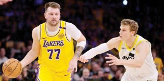Los Angeles Lakers’ Luka Doncic dribbles the ball while being defended by Utah Jazz’s Lauri Markannen. PHOTO COURTESY OF USA TODAY