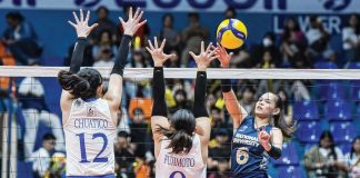 National University Lady Bulldogs’ Evangeline Alinsug drops the ball against the defense of Ateneo de Manila University Blue Eagles' Takako Fujimoto. UAAP PHOTO