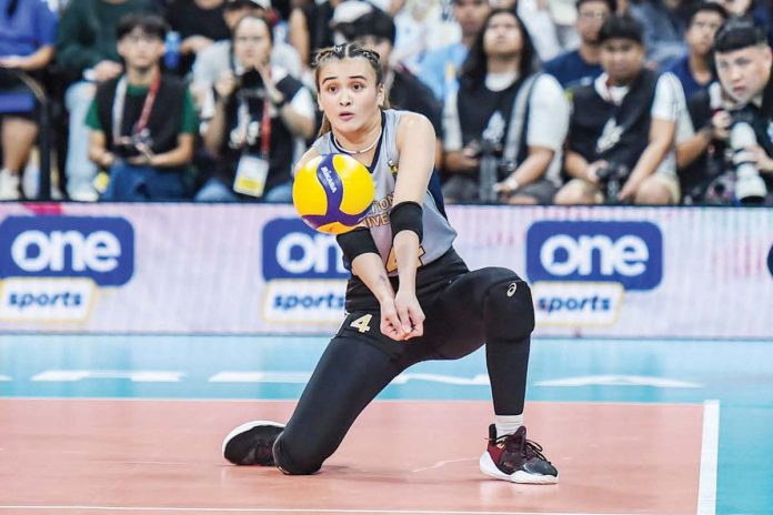 sports_NU_resized National University Lady Bulldogs’ Mhicaela Belen receives the ball. UAAP PHOTO