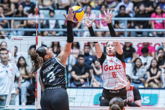 sports_PVL_1_resized Ilongga Aiza Maizo-Pontillas of Petro Gazz Angels attempts to block the shot of Galeries Tower Highrisers’ Ysabel Jimenez. PVL PHOTO