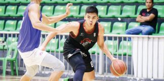 Sherwin Concepcion of Starhorse-Basilan wards off a defender. PHOTO COURTESY OF STARHORSE-BASILAN
