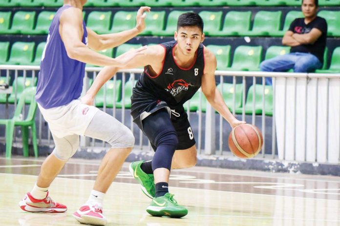 sports_Starhorse_resized Sherwin Concepcion of Starhorse-Basilan wards off a defender. PHOTO COURTESY OF STARHORSE-BASILAN