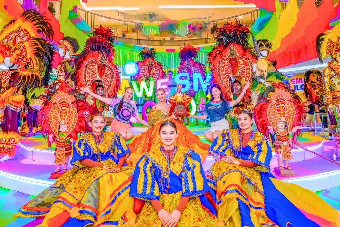 3 AWESM ILOILO 2025. The colorful and well-crafted costumes designed by talented Ilonggo artists, of the eight tribes participating in Dinagyang 2025 are currently on display at SM City Iloilo. Visitors are given the chance to be the first to see the costumes before the actual tribes competition at the Freedom Grandstand. Mall goers can have an immersive #AweSM experience by virtually trying on the headdresses of your favorite tribes, creating an interactive and shareable souvenir experience.
