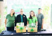 TO SUPPORT LOCAL FARMERS: MORE Power celebrates 5th anniv with Harvest Festival (From left): MORE Power AVP for Human Capital Management Daphne Karina De Pedro; Iloilo City Government agriculturist Ynigo Garingalao; MORE Power VP for Marketing and Corporate Affairs and Customer Care Department, Ma. Cristina D. Cabalhin, and Allied Botanical’s Erwin Elmido. Garingalao receives seeds from MORE Power and Allied Botanical for the Uswag Nursery. This initiative promotes urban gardening and sustainability in Iloilo City.